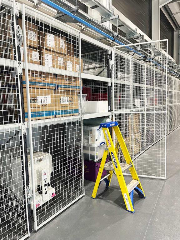 Design and Service Company uses longspan shelving with lockable doors ...